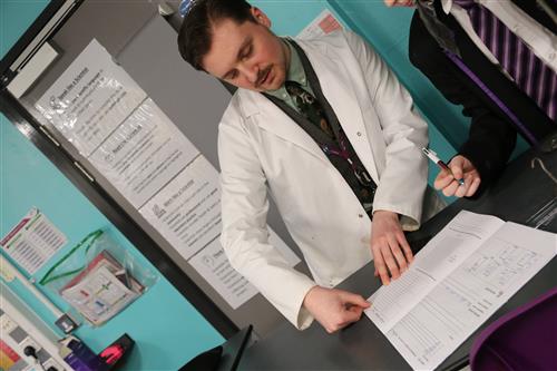 Working with students.